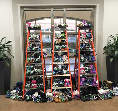 Turner Puts Heart & "Sole" in Boot Donation to Horizons For Homeless Children